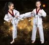 Outros artigos esportivos Taekwondo Roupas Crianças Adulto Manga Comprida Manga Curta Algodão Homens Mulheres Primavera Verão Karate Roupas Terno de Treinamento 230912