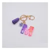 Mode harts Flash Pink 26 Letter Nyckelringar Clash Color Mosaic Tassel Pendant Purple Glue English Word Keychain Drop Delivery