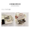 여성 2024 New Fashion Lock Buckle Small Square 핸드 헬드 레이디 84% 온라인 공장.