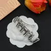 Wholesale M IU letter rhinestone pearl silver hairpin premium sense niche design fashion bangs spring clip