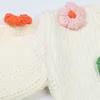 906 Otoño 2023 suéter de mujer de manga larga con cuello en V cárdigan blanco marca mismo estilo rayas blancas para mujer MINGMO