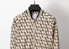 Designer mens jaqueta primavera e outono windrunner tee moda com capuz esportes blusão casual zíper jaquetas roupas Ásia M-3XL E07