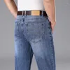 Jeans da uomo dritti 2023 sottili larghi elastici a vita media business casual maschile pantaloni di marca di abbigliamento in denim