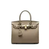 Bag handväskor Platinumdesigner Stora litchi mönster kvinnlig handhållare messenger röd brud krokodil original logotypläder