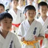 Andere sportartikelen Hoge kwaliteit Kyokushinkai dogi Dobok 12oz 100% katoenen canvas Karate Uniform Kimono Gi Doek voor kinderen Volwassen Gratis witte riem 230912