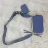 Projektantka Mężczyźni Crossbody Bag Snapshot Fajna i elegancka torba Słynna kamera Mała crossbody z monetą mini -kobietę metalową klamrę na ramię