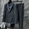 24SS Projektanci męskie garnitury Blazery w stylu zachodnim ubrania w paski w paski Jacquard nadruk płaszcze damskie nieregularne wydrukowane kurtka swobodna wysokiej klasy garnitur
