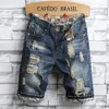 Herr jeans mode shorts män hål personlighet sommar koreansk stil rippade jean för smala byxa motorcykel tights265b