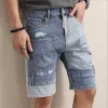 shorts en jean asymétrique