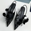 Brushed leather slingback pumps with floral appliques 1I317N Fall Winter 2023 collection combines structural innovation with an elegant character that is typical