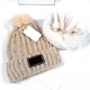 Gorros Gorros de lana al aire libre Sombreros de invierno para mujeres Hombres Moda Gruesa Gorra con puños de alta calidad Diseñador Sombrero de punto Regalo de Navidad