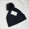 2024All'ingrosso di alta qualità berretti invernali Cappelli da donna e da uomo Berretti con vera pelliccia di procione pompon Warm Girl Cap snapback pompon beanie AA88