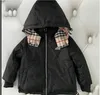 Kurtki 2023 Nowe dzieci Puffer Down Coats Designer luksus z kapturem w kabinie odwracalny płaszcz mody dziewczęta chłopię
