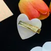 Resin peach heart earrings light luxury m IU tortoiseshell earrings women's hairpins wholesale