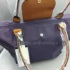 Sacos de marca clássica bolsa feminina couro genuíno dobrável impermeável náilon grande armazenamento cavalo 70º aniversário compras sling bag265y