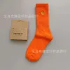 Chaussettes de serviette pour hommes Mode Marque nord-américaine Karhart Bottom Gold Brodé Longueur moyenne Pur coton Vêtements de travail pour hommes Femmes Romantique