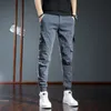 Jeans pour hommes de haute qualité hommes sarouel denim pantalons poches décors jogging sport style rue mode cargo couleur pure décontracté 230914