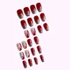 Falsas uñas retro vino rojo falso con material de resina superior para la celebración del año chino