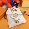 Nyckelringar Design Bag Charms Luxury Designer Par Key Chain New Sunflower Key Ring Pendant Söt Panda Key Holder Fashion Accessories for Women Men X0914