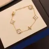 Merk Klassieke Mode ketting gouden damesarmbanden met logo officiële maat ontwerp gouden vier bloemblaadjes armbanden vervagen nooit