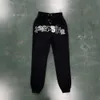 Męskie bluzy bluzy brytyjskie projektant Trapstar Tracksuit Mężczyźni Widcard Zip-Black /Monochrome 1 Najwyższej jakości haftowane kobiety z kapturem spodne