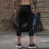 Abbigliamento da palestra Uomo Pantaloni corti ad asciugatura rapida Collant da uomo Strato base a compressione Pantaloncini da corsa Fitness Equitazione Leggings Sport MM353