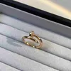 Solitaire Ring Designer Key Ring Nail Gold Midi Alliage d'acier Plaqué or 925 Sterling Silver Designer Bijoux Promesse Hommes Femmes