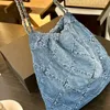 2024 frauen Marke Handtasche Luxus Denim Müll Tasche Einzelnen Schulter Rucksack Crossbody Unterarm Metall Spleißen Kette Große Kapazität Mit Inneren