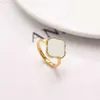 Solitaire ring lyxiga smycken fyra bladklöver kristallring modemärke vigselring för kvinnor lyxiga naturliga turkosa designer ringar rostfritt stål smycken