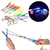 Autres lumières Éclairage Incroyable LED Light Arrow Rocket Hélicoptère Rotation Jouets volants Catapt Toy Up Kid Party Favor Fun Cadeau Élastique Dr Dhmjk