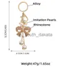 Key Rings Alloy Crystal Cute Bow Imitation Pearls Flower Key Ring Car Key Chain Girl Bag Pendant With Accessories Best Gift Jewelry x0914