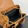 Frosted Backpack Brown Tassels Shoulder Bag Cowhide Leather Golden Hardware Designer Letters Drawstring Handbags Purse