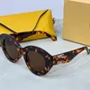 Gafas de sol de diseño de lujo para mujer Gafas de ojo de gato con estuche Diseño de marco irregular Gafas de sol Conducción Viajes Compras Ropa de playa Gafas de sol