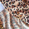 10 stuks luipaardprint boog voorkant lycra spandex stoelhoes voor bruiloftsdecoratie