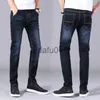 Jeans masculinos outono inverno homens jeans negócios casual estiramento magro jeans luz azul preto calças masculinas marca calças plus size 28-402750 x0914 x0911
