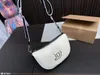 Delikat knockoff -designer Handväska Half Moon Shoulder Bags Loop Fashion Baguette Bag M81094 med låda