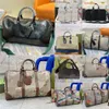 Kabartmalı Duffle Bag Baskı Tuval Deri Çanta Karıştırma G Yama Luxurys Omuz Çantaları2778