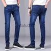 Jeans masculinos outono inverno homens jeans negócios casual estiramento magro jeans luz azul preto calças masculinas marca calças plus size 28-402750 x0914 x0911