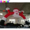 Swings wholesale Attractive Durable Giant Xmas Inflatable Christmas Arch With Santa Claus Entry Gate Archway for Event Decoration