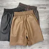 Pantalones cortos para mujer Julypalette piel de oveja auténtica cintura elástica cuero 2023 Otoño Invierno sólido Casual alto suelto pierna ancha piel de cordero