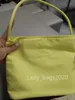 Mucu And Ebony Bags Diseñador Bolso De Nylon Nicho Mujeres Totes Bucket Monedero Bordado Desplazamientos Hombro Tote Impermeable Portátil Pequeño Bolso De Axila Bolso De Axila