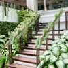 装飾的な花の緑の人工ブドウの合成草プラスチック製の苔壁吊り熱帯の偽の植物秋の庭のバルコニーの家の装飾
