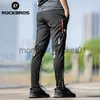 Jeans da uomo ROCKBROS Pantaloni da ciclismo leggeri e comodi Uomo Donna Primavera Estate Pantaloni sportivi traspiranti ad alta elasticità Pantaloni riflettenti J230915