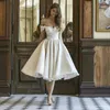 Kort glitter bröllopsklänning elegant spets applicerade glänsande brudklänningar från axel knälängd prinsessa fest strandklänningar bes1330n