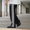 Мужские брюки Мужские брюки Иглы Повседневные спортивные штаны с обеих сторон Черно-белая полоса Классическая вышивка Мужчины Женщины Универсальные свободные брюки в стиле ретро AWGE L230915