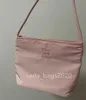 Mucu And Ebony Bags Diseñador Bolso De Nylon Nicho Mujeres Totes Bucket Monedero Bordado Desplazamientos Hombro Tote Impermeable Portátil Pequeño Bolso De Axila Bolso De Axila