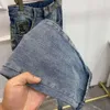 Hög version Men Jeans Metal Tag denim Pants D Designer broderi Jeans Fashion Cashew Flower Stitching Straight Ben