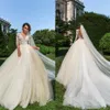 Kryształowy projekt Sheer Jewel Neck Lace Ball Suknie ślubne z długimi rękawami Szampan Szampan plus rozmiar ślubny suknie ślubne Suknie ślubne 237x