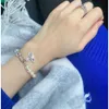 Pulsera de perlas con alfiler viuda de la emperatriz occidental con incrustaciones de diamantes de Vivian Saturn de alta versión