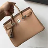 Sac à main Swift Designer Sac en cuir de vache Petite taille 25 Bouton argenté pour femme Messenger à une épaule de haute qualité